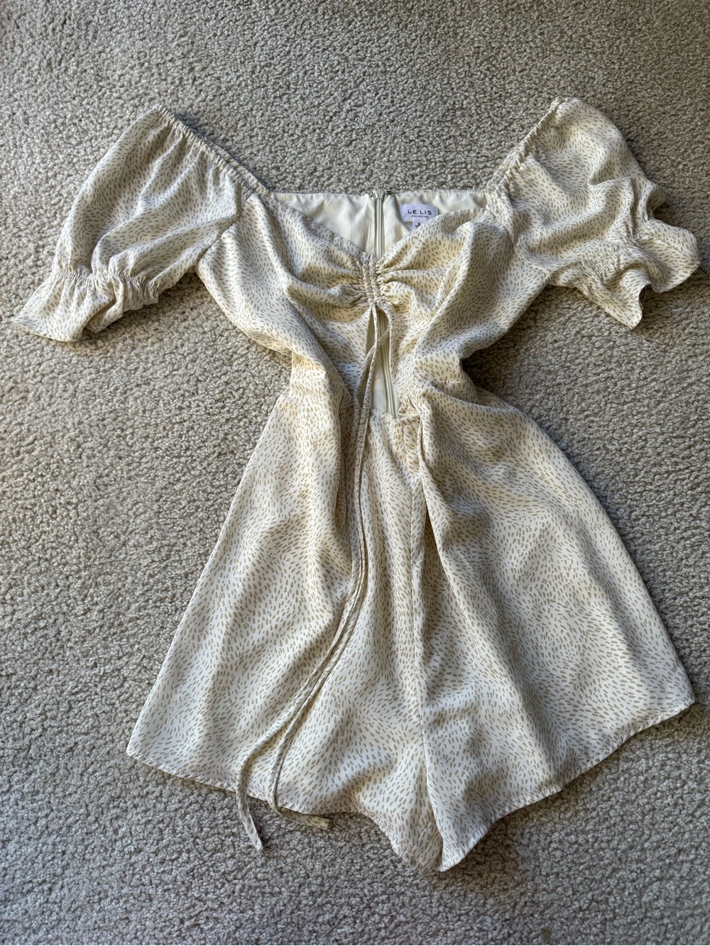 Le Lis Cream Speckled Off-Shoulder Romper with Tie Front